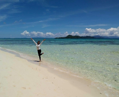 White sand beach and turquoise shallows on a Milne Bay island
